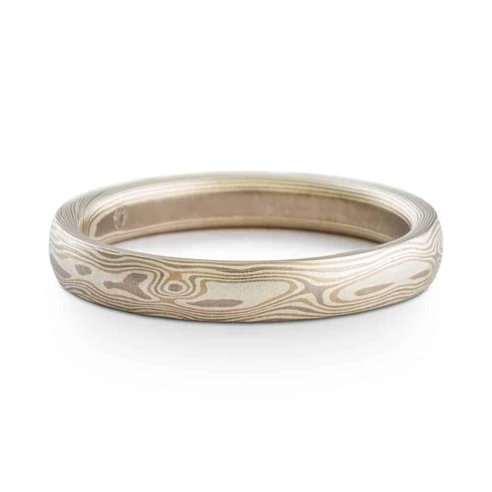 slim mokume gane band made with white gold, palladium and silver