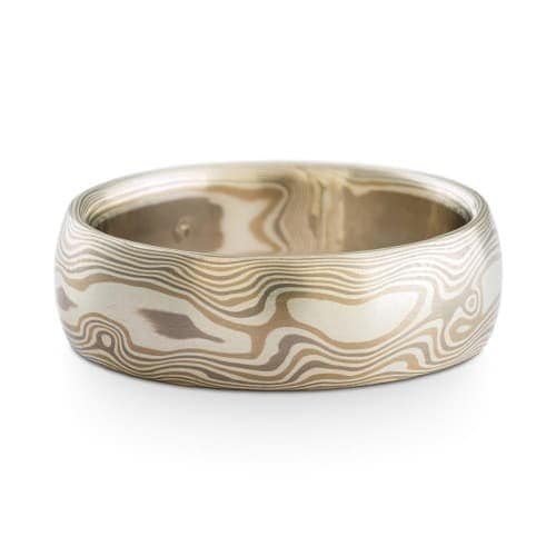 wide mokume gane wedding band in light palette and woodgrain pattern