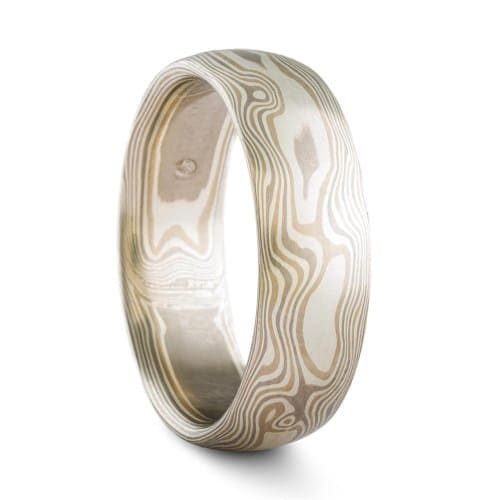 wide mokume gane wedding band in light palette and woodgrain pattern