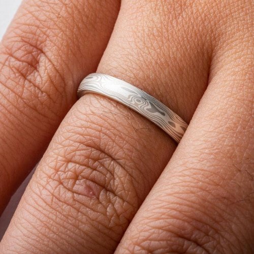 slim mokume gane band made with white gold, palladium and silver
