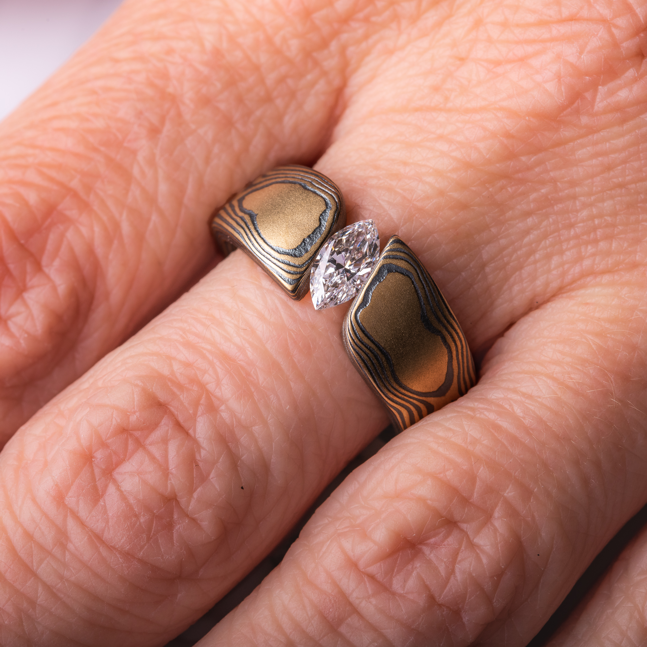 Sophisticated Diamond Tension Set Mokume Wedding Ring - Image 7