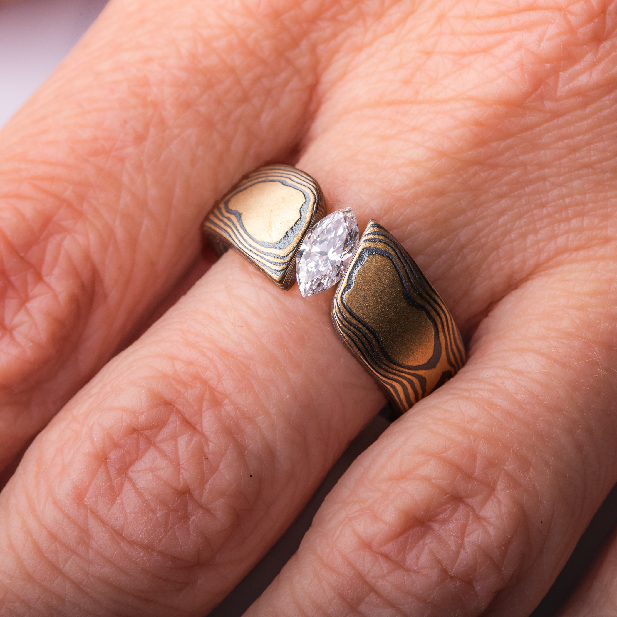 Sophisticated Diamond Tension Set Mokume Wedding Ring - Image 8