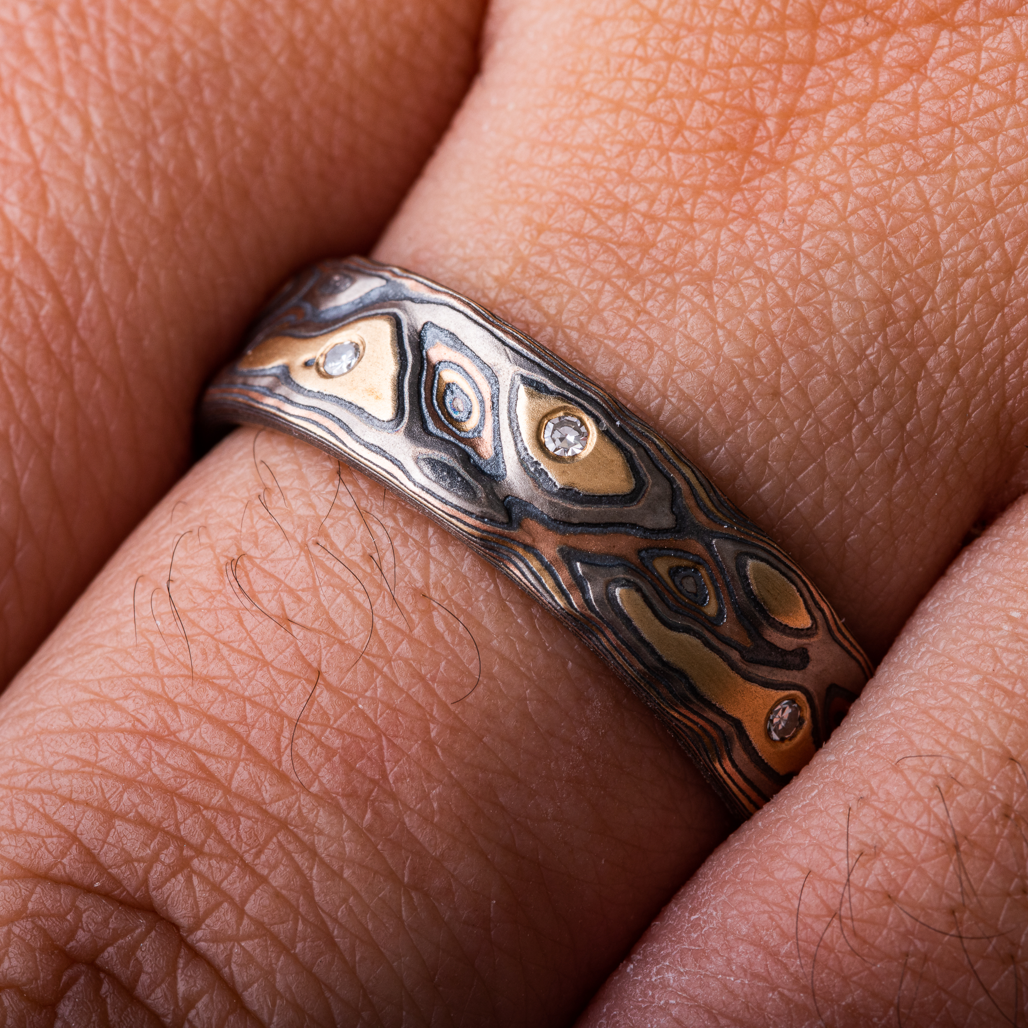 mokume gane mens wedding ring that is heirloom quality- resembles woodgrain made of precious metals