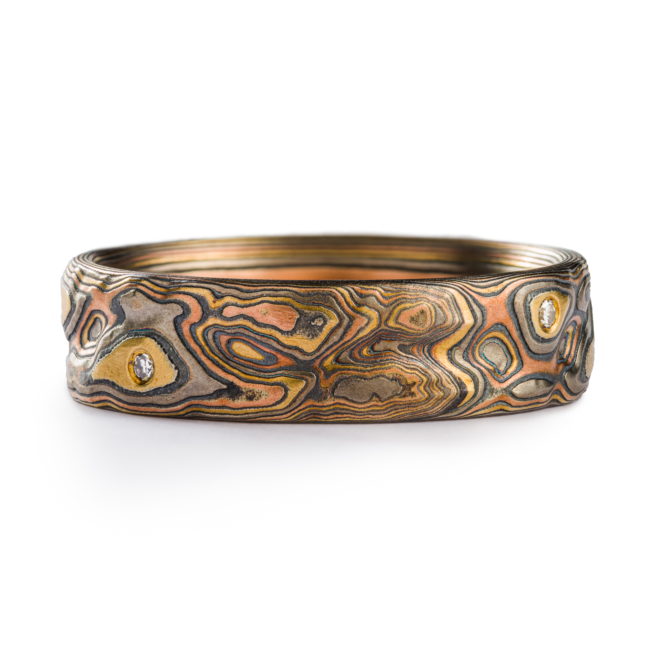 mokume gane mens wedding ring that is heirloom quality- resembles woodgrain made of precious metals
