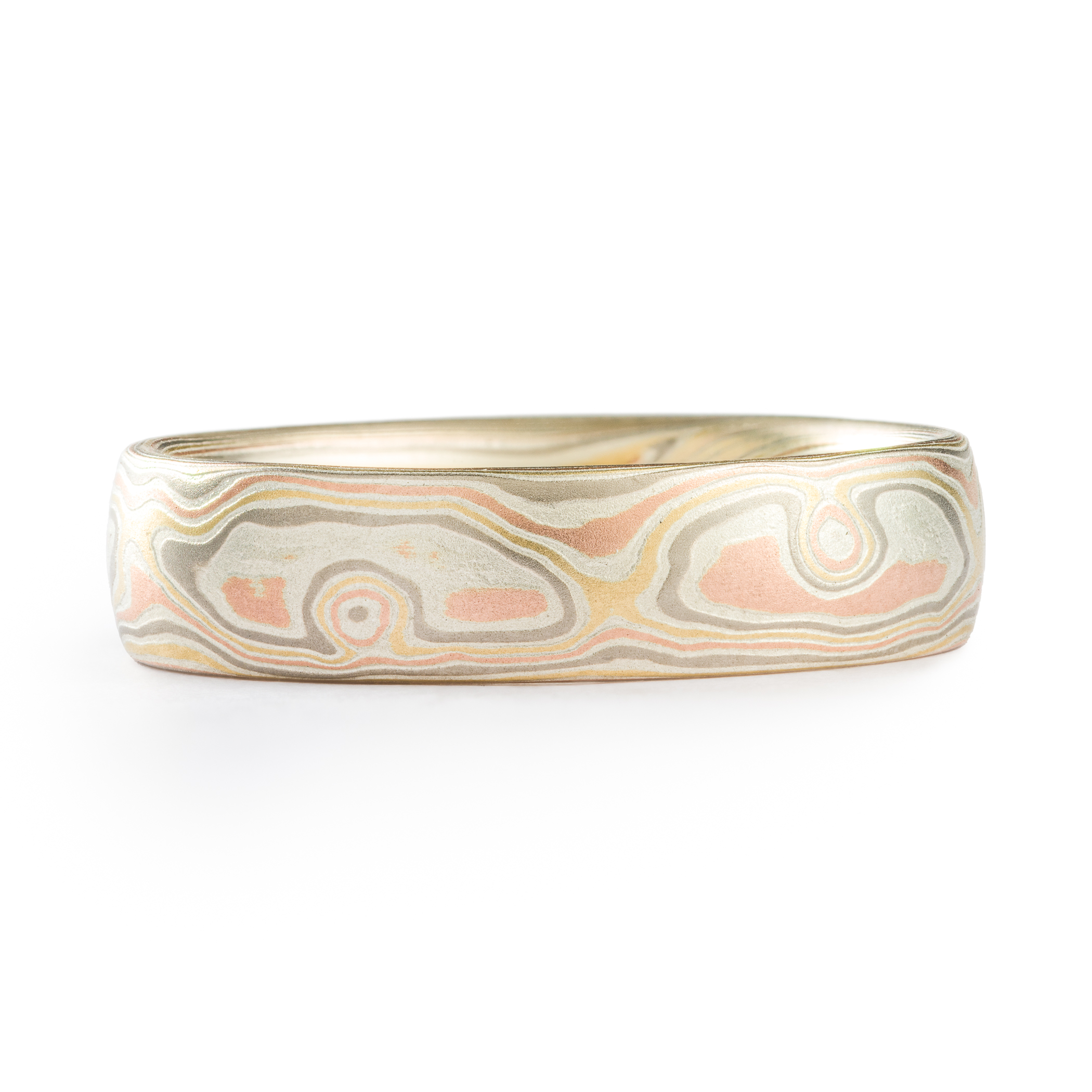 mens wedding ring in red gold yellow gold and palladium. mokume gane custom made