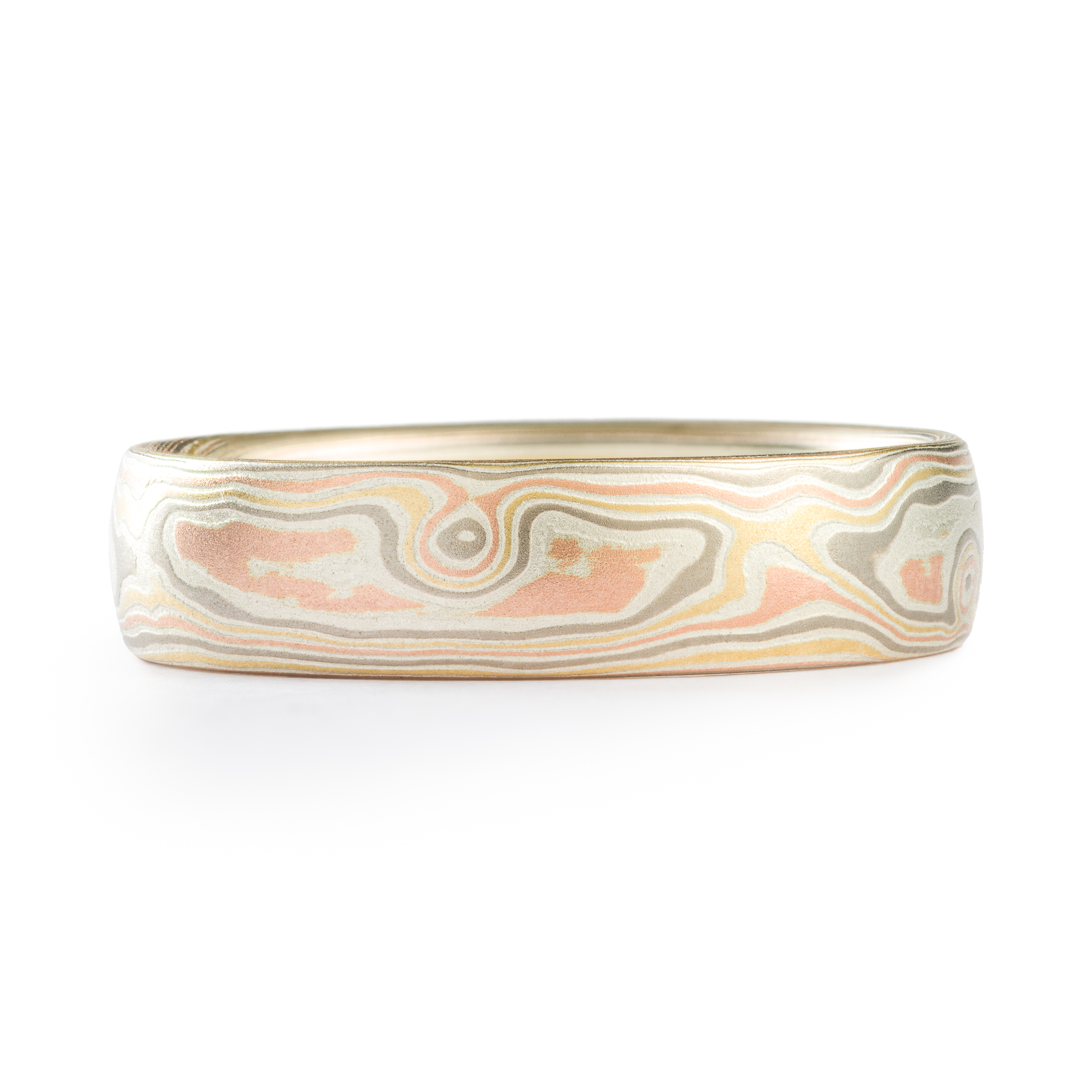 mens wedding ring in red gold yellow gold and palladium. mokume gane custom made