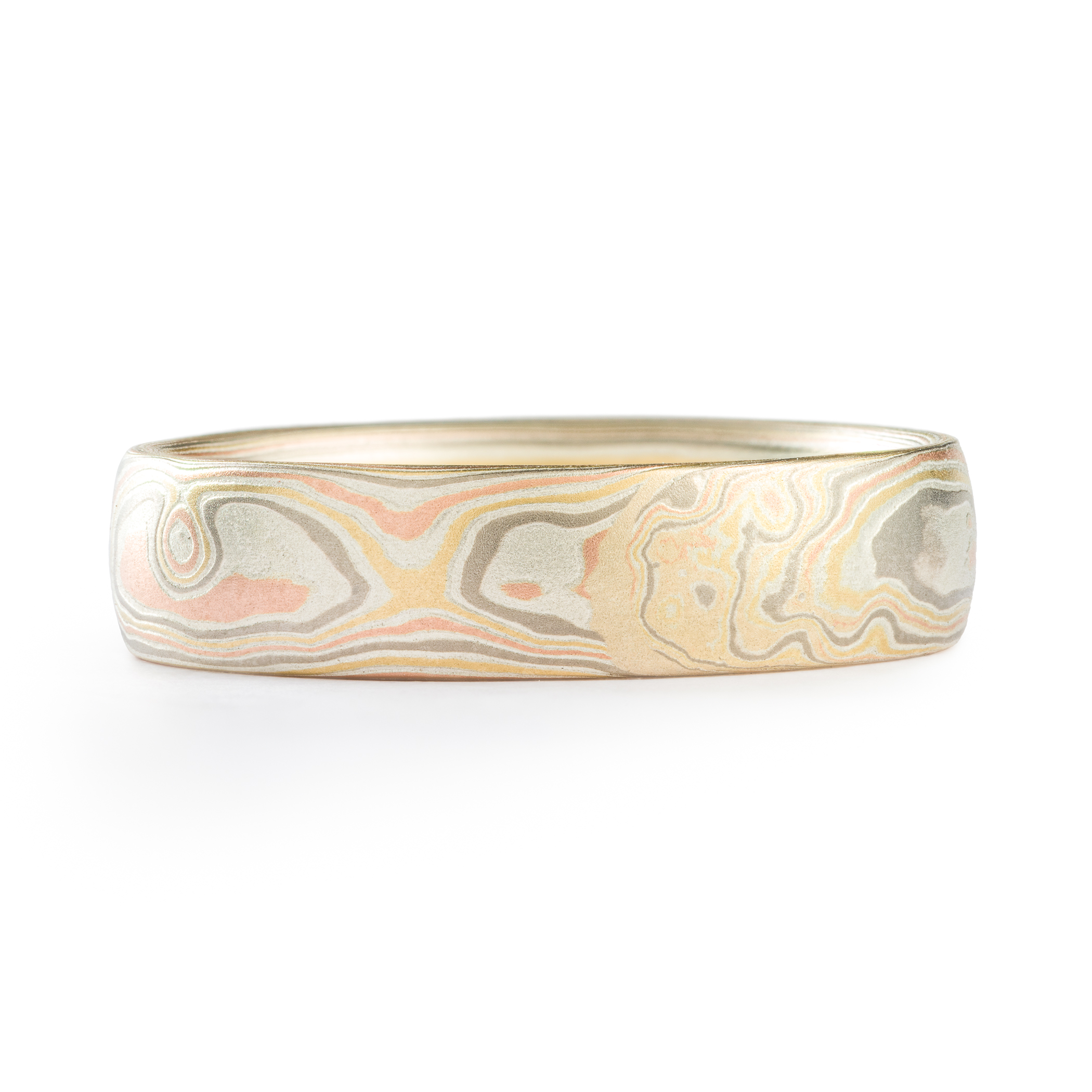 mens wedding ring in red gold yellow gold and palladium. mokume gane custom made