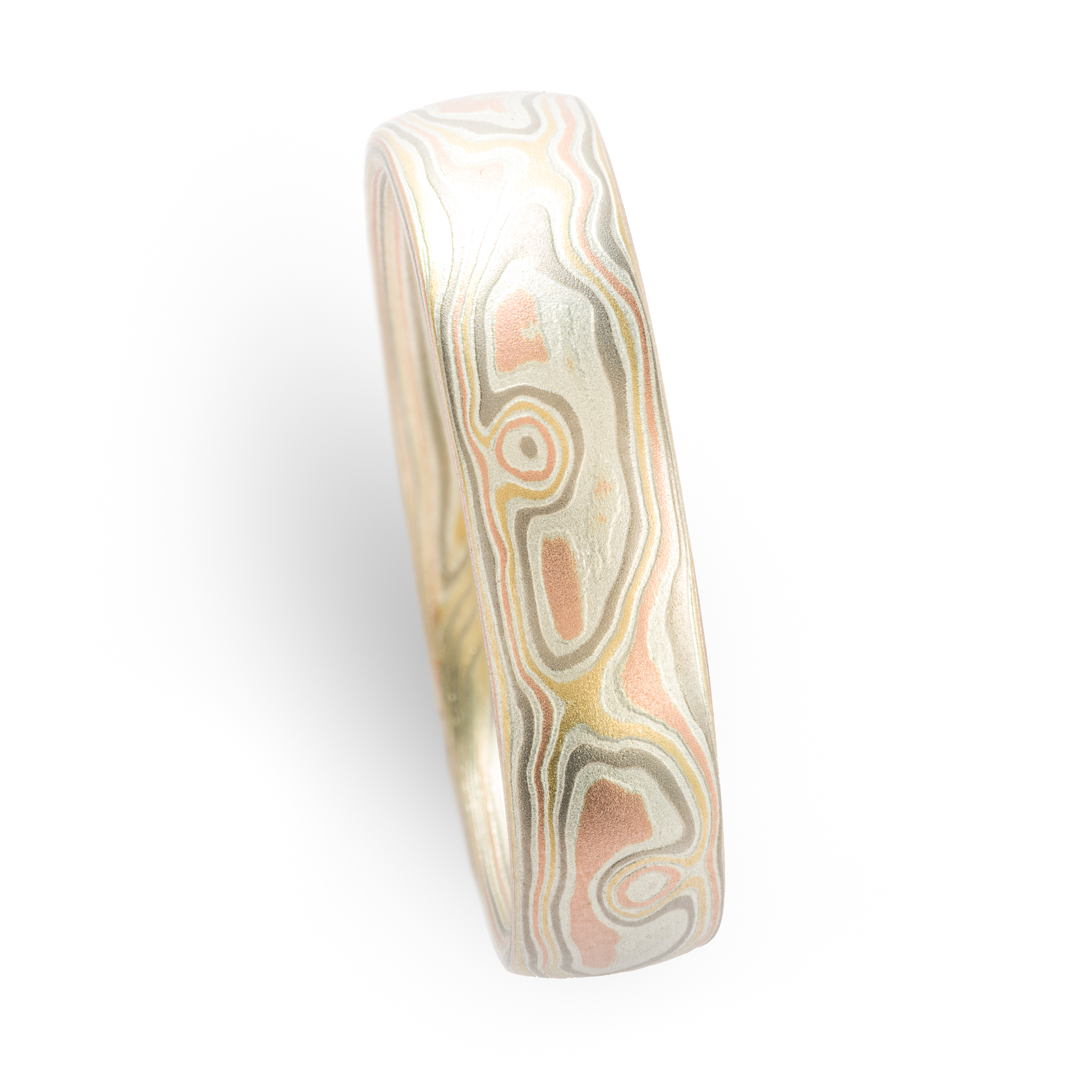 mens wedding ring in red gold yellow gold and palladium. mokume gane custom made