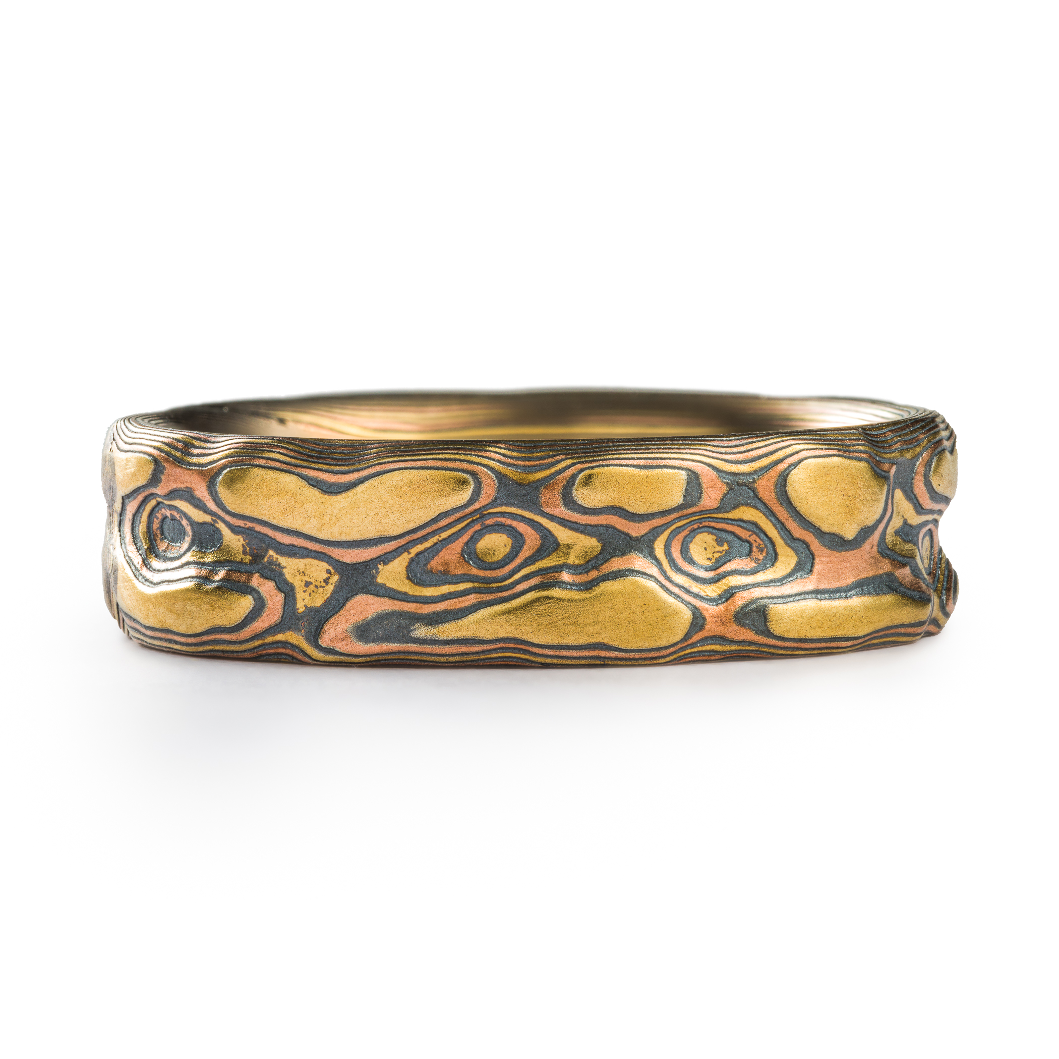 Textured mokume gane gold ring.