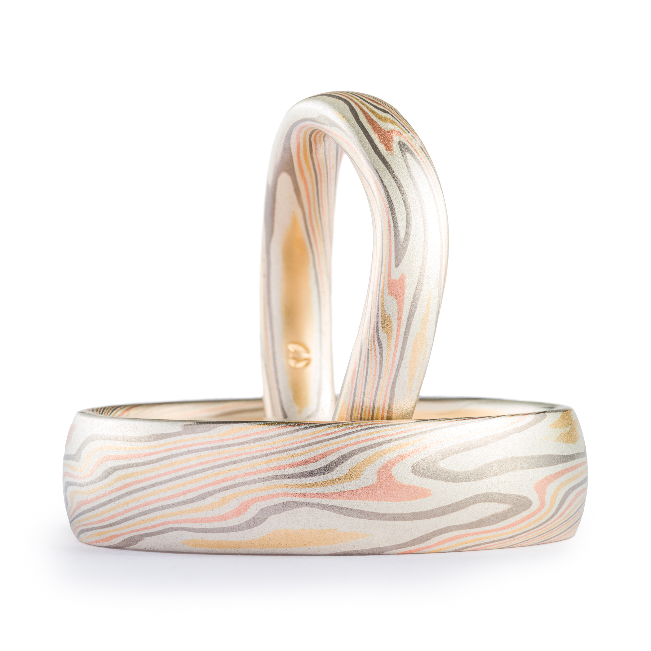 matching ring set, thinner ring has been contoured, could fit with an engagement ring