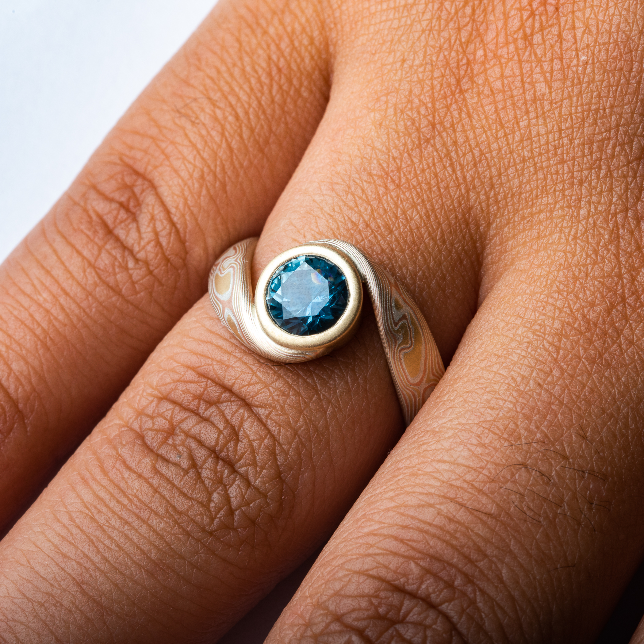 Bypass Style Mokume Ring with Blue Sapphire - Image 5