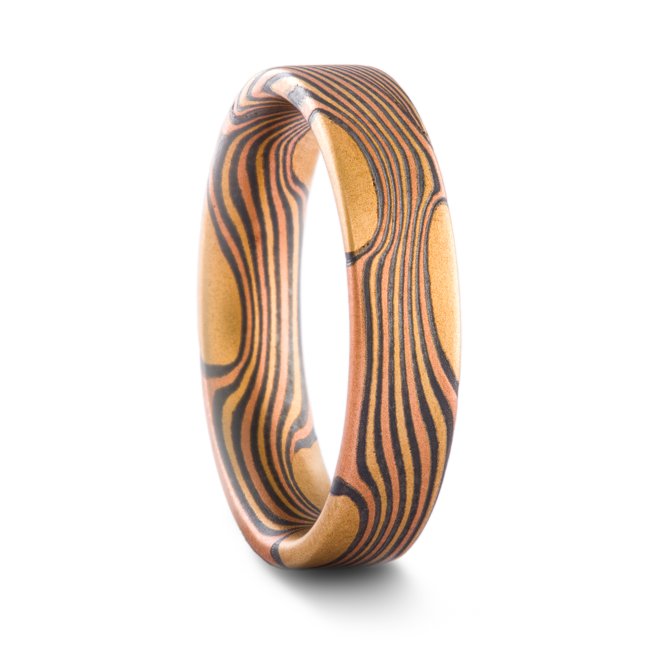 Flat profile mokume men's ring made with gold, red gold and oxidized silver.