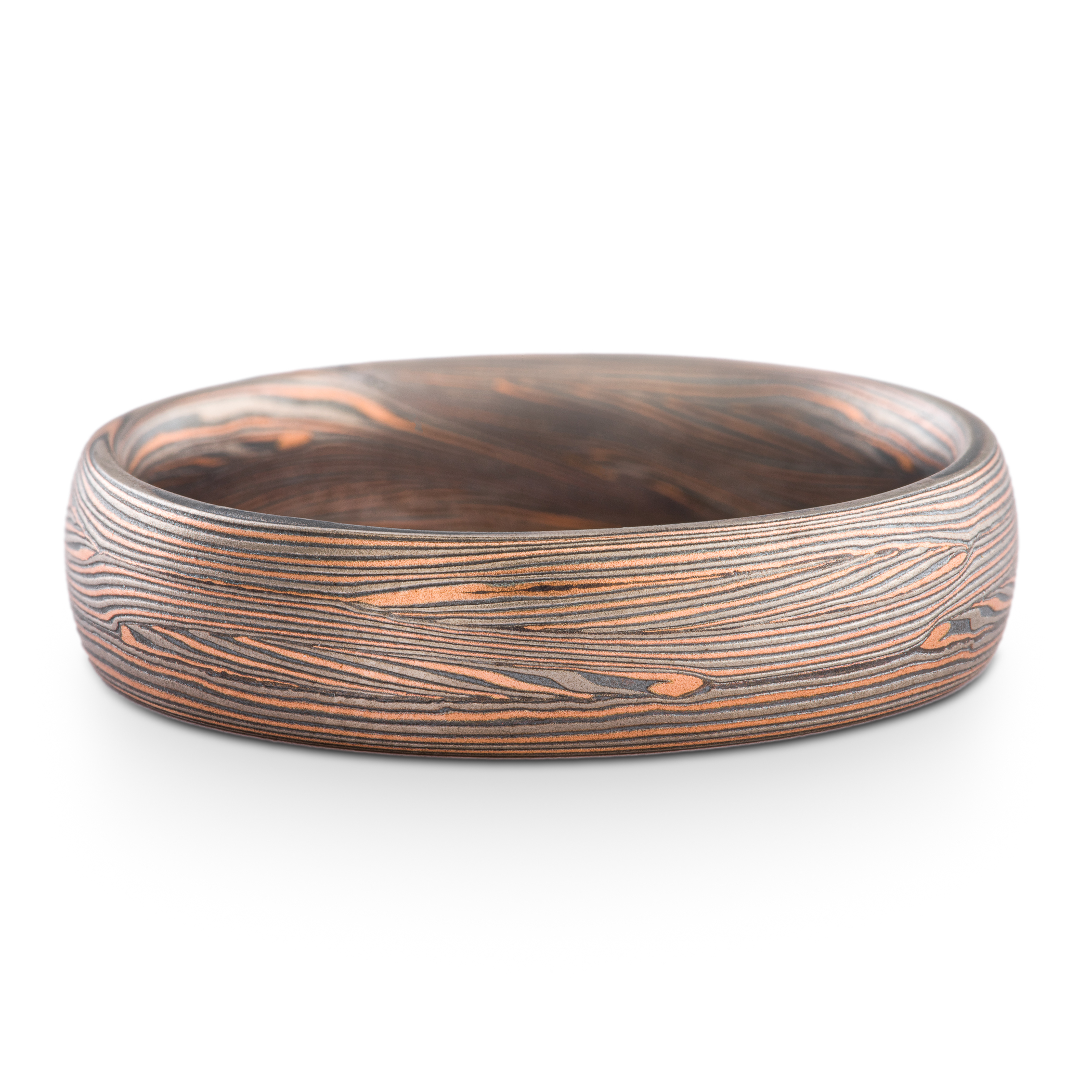 Mokume gane ring made in Arn Krebs Flow pattern made in a linear style with flowing fine lines. Made with red gold, palladium and oxidized silver.