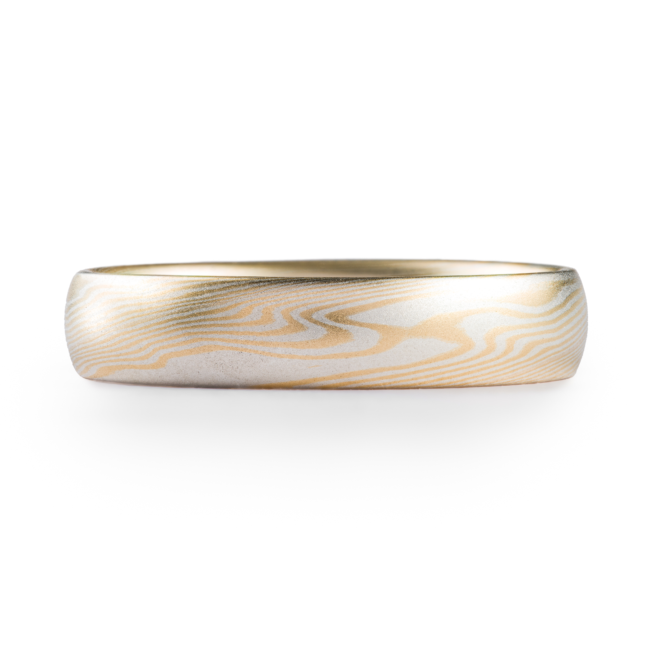 very subtle feeling yellow gold and silver mokume gane ring, soft and delicate feeling wedding band