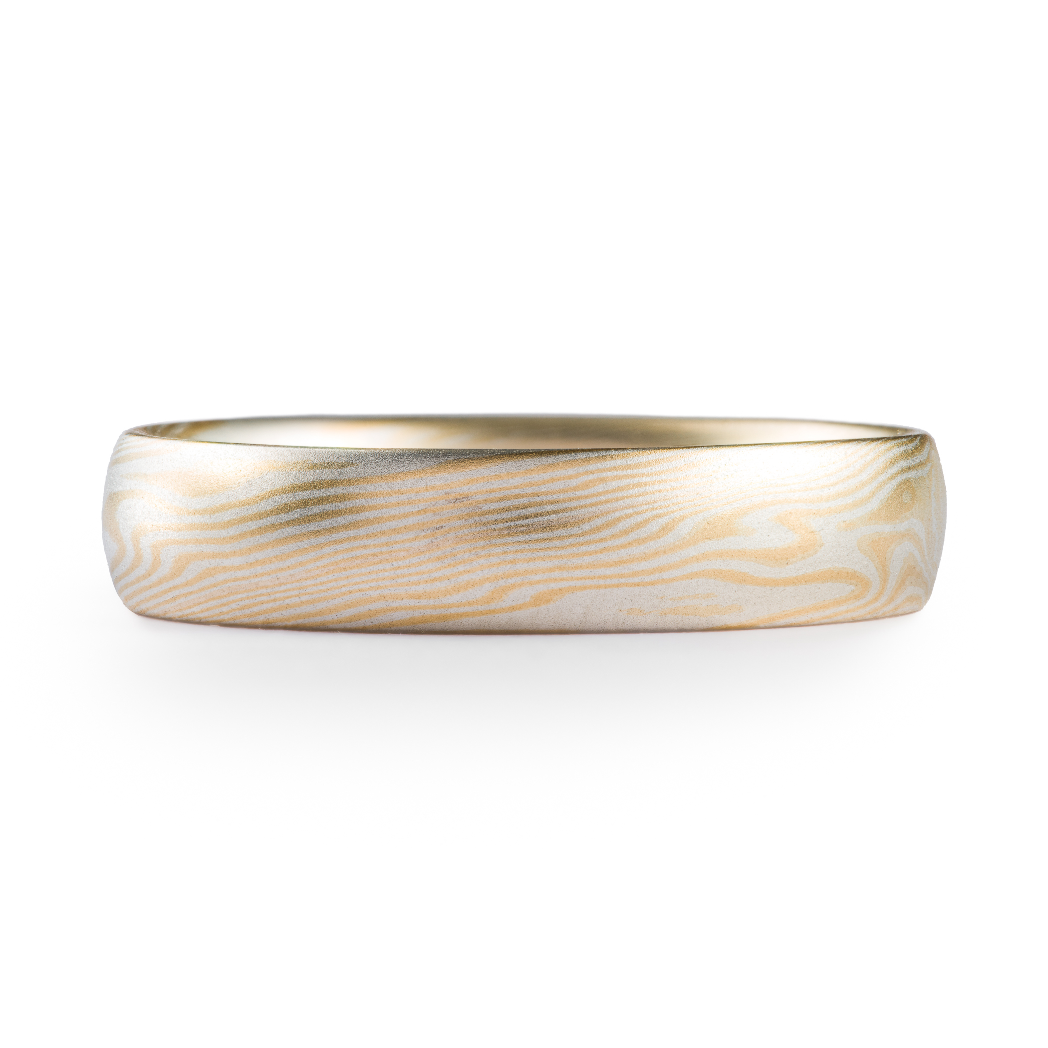 very subtle feeling yellow gold and silver mokume gane ring, soft and delicate feeling wedding band