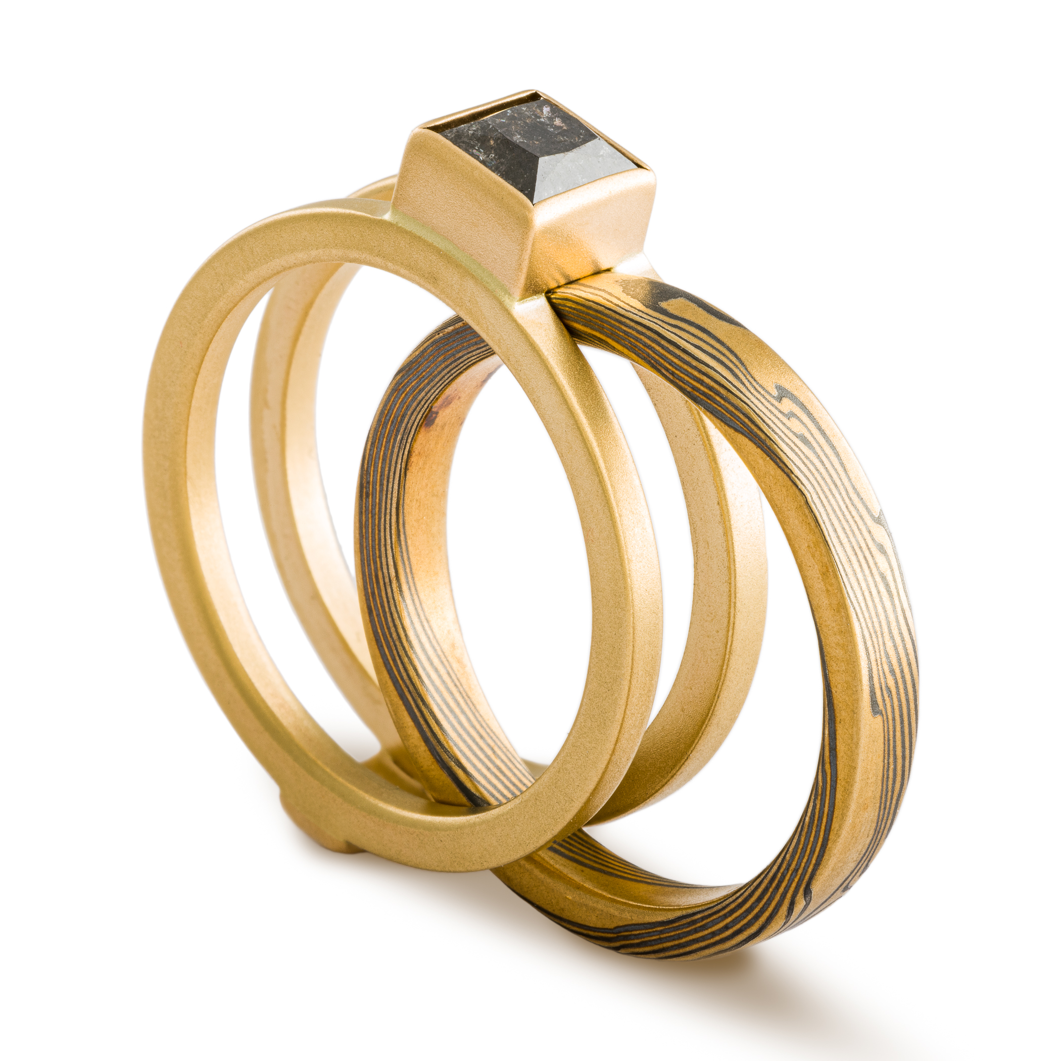 Mokume Gane gold and silver ring with gold ring guard with square black diamond.