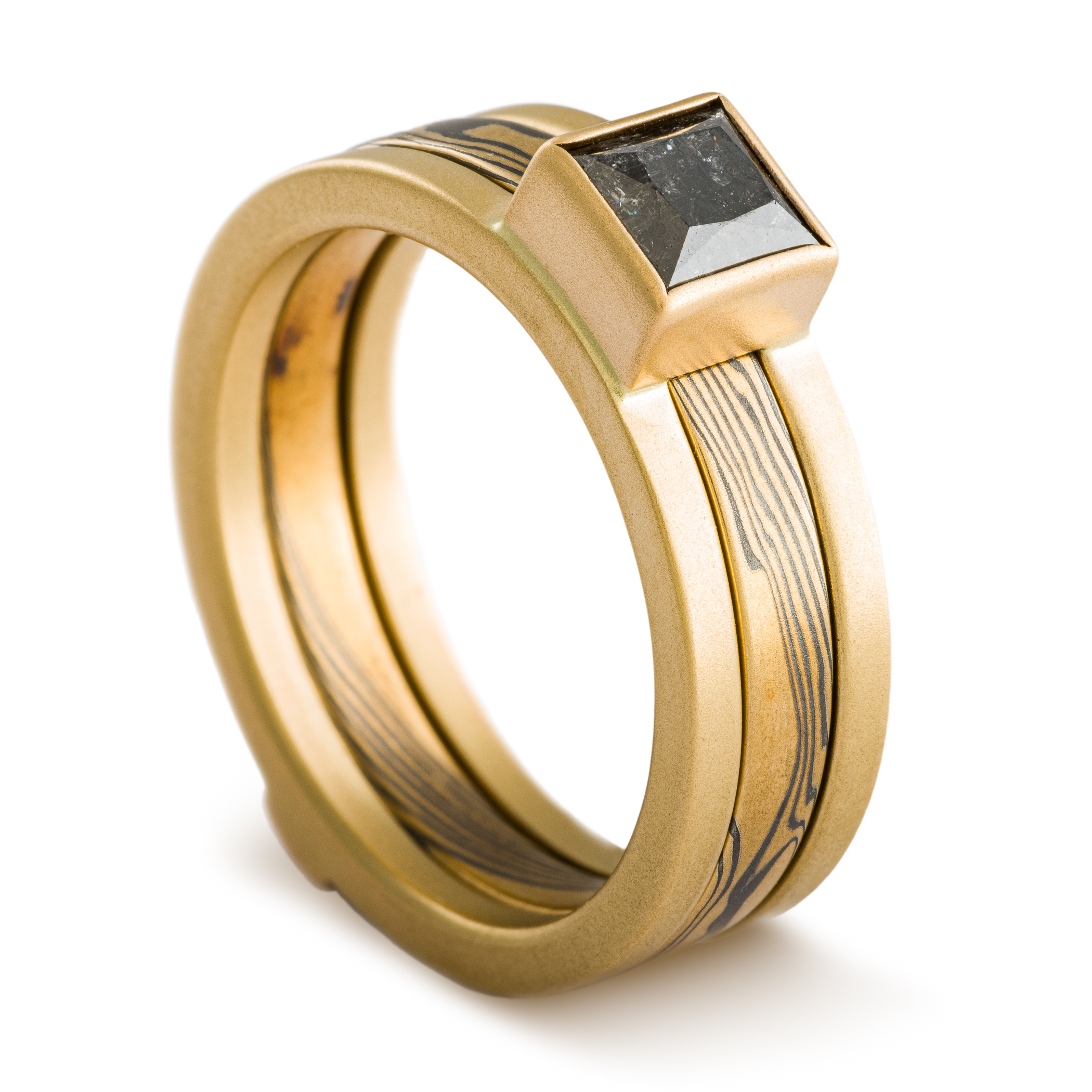 Mokume Gane gold and silver ring with gold ring guard with square black diamond.