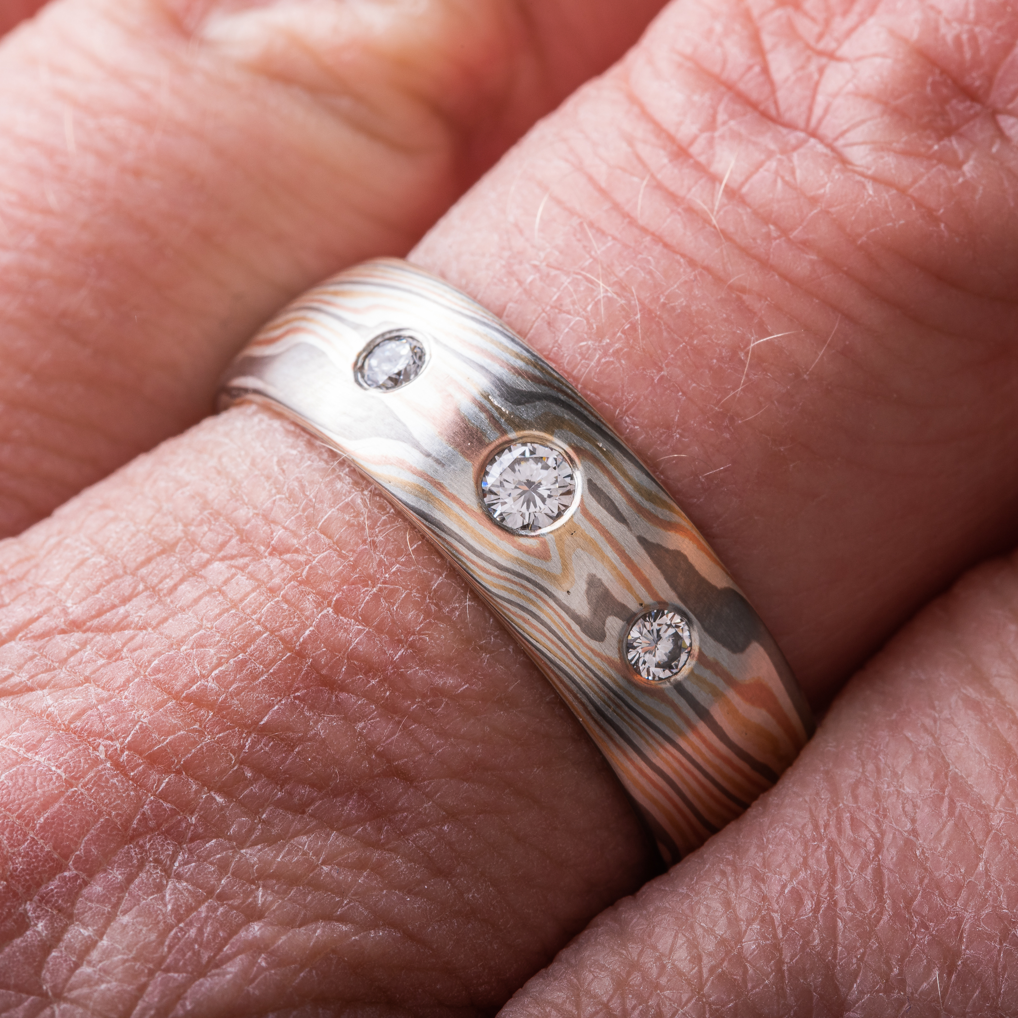 Classic Mokume Ring with Flush Set Diamonds - Image 4