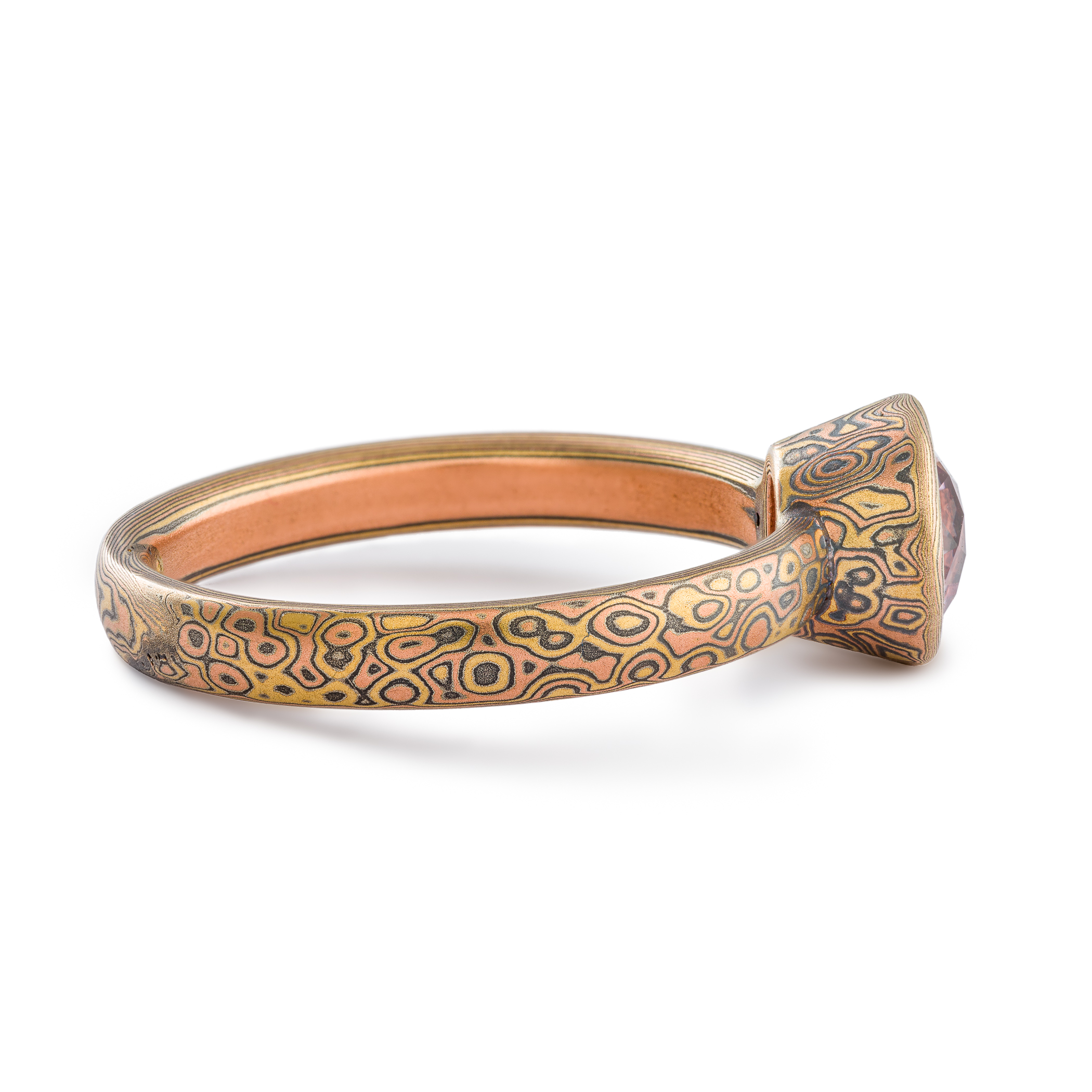 Mokume Gane ring or engagement ring arn krebs, pink sapphire in a mokume bezel, droplet pattern and fire palette, yellow gold red gold and silver