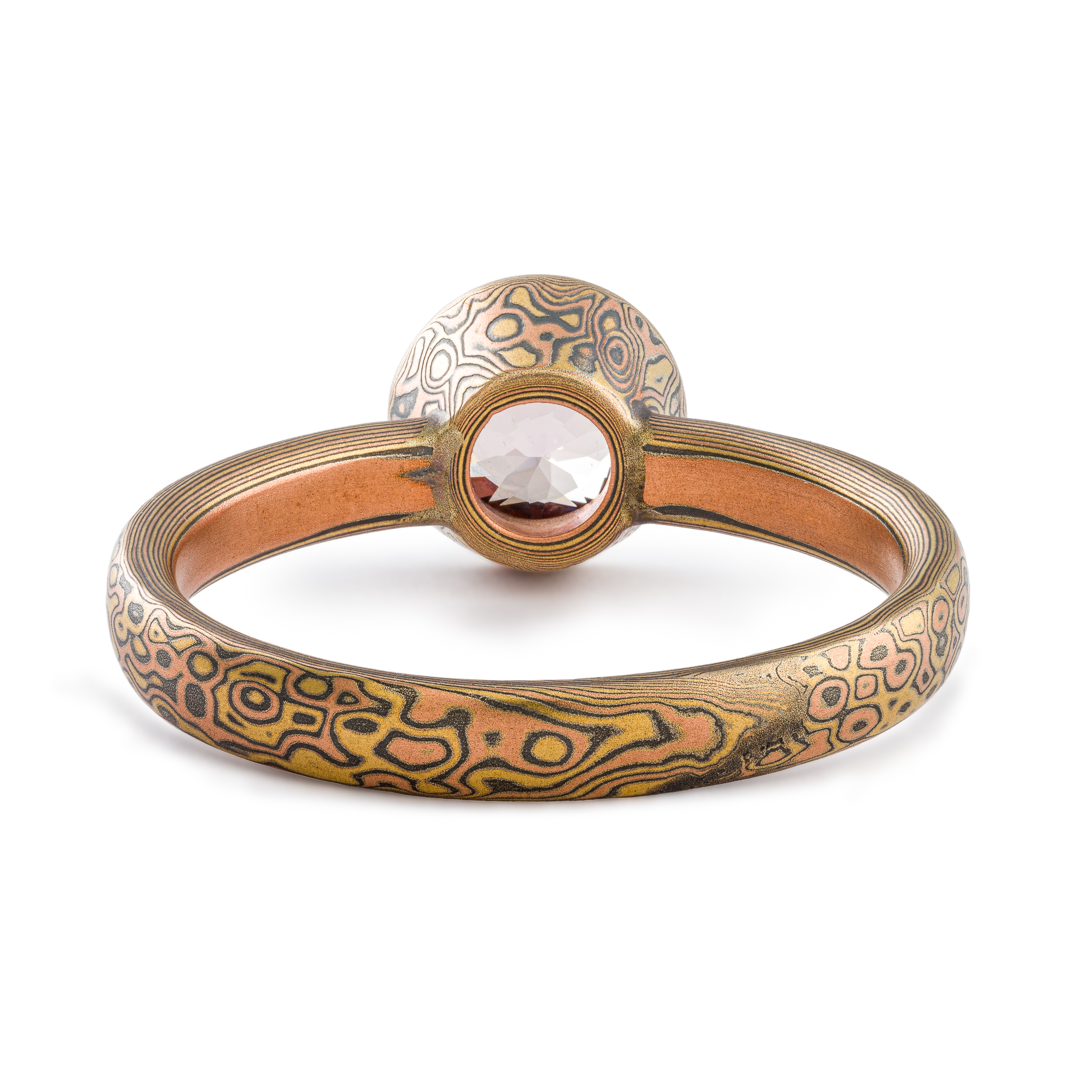 Mokume Gane ring or engagement ring arn krebs, pink sapphire in a mokume bezel, droplet pattern and fire palette, yellow gold red gold and silver