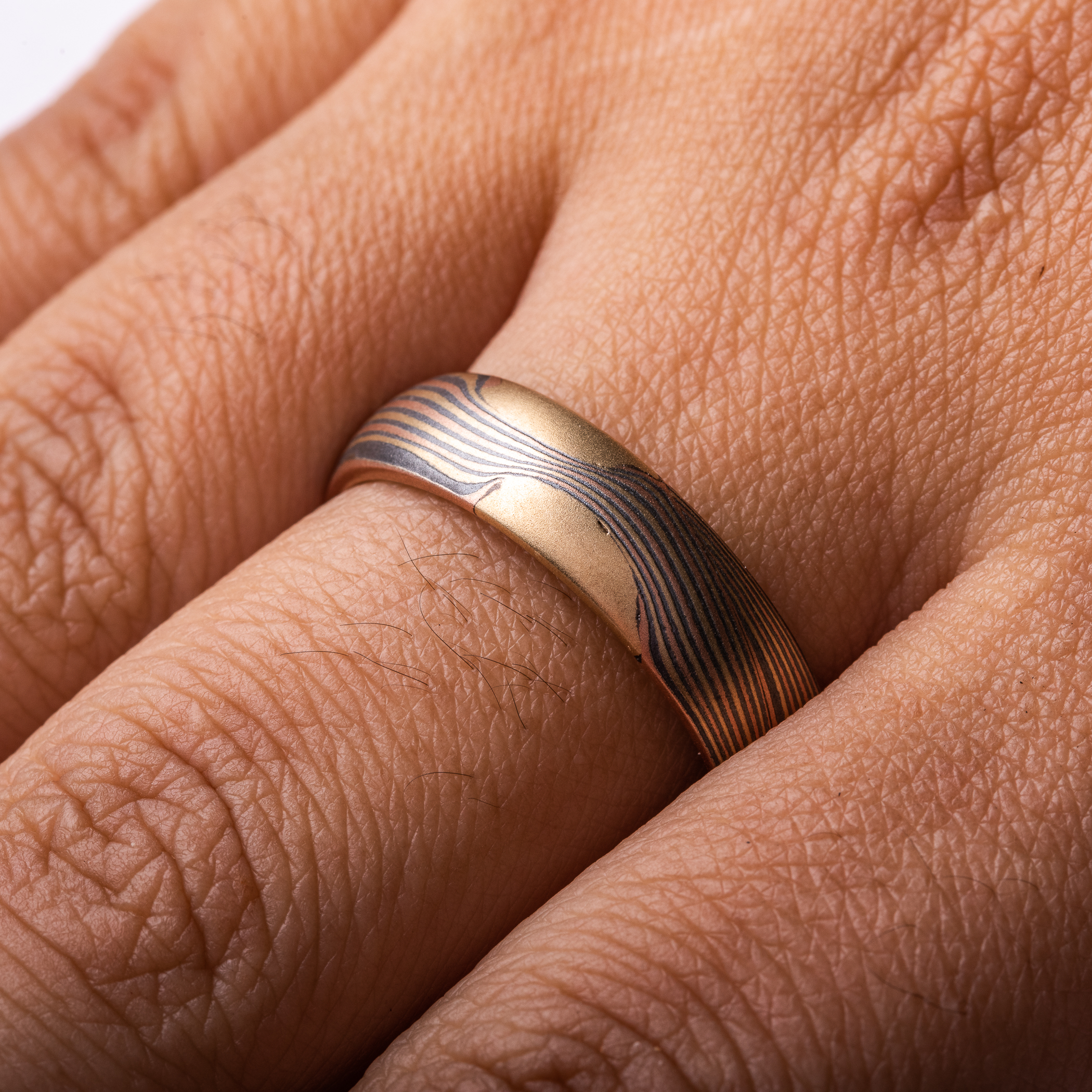 yellow gold, red gold, rose gold, silver, black, wide thick ring lines with islands of gold