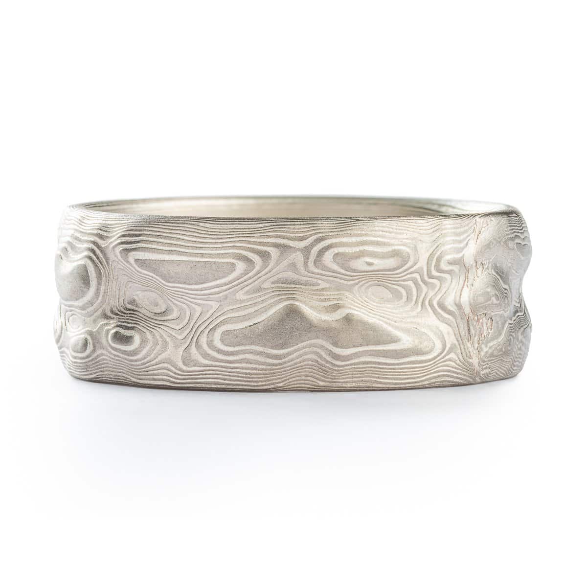 textured mokume gane ring made in Arn Krebs Guri Bori pattern inspired by topography and mountain ranges, made with silver and palladium