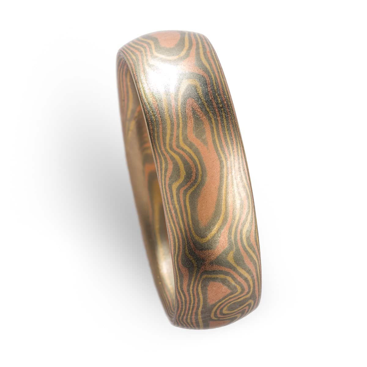 Rustic and elegant Mokume Gane band with woodgrain pattern and Cinders metal combination in low dome and satin finish.