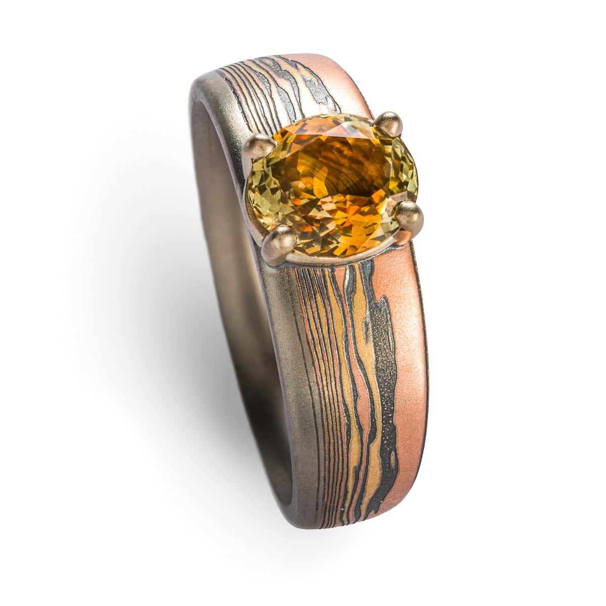 Mokume Gane ring with Fire metal combo, custom landscape design, sapphire, 14k yellow & red gold, sterling silver.