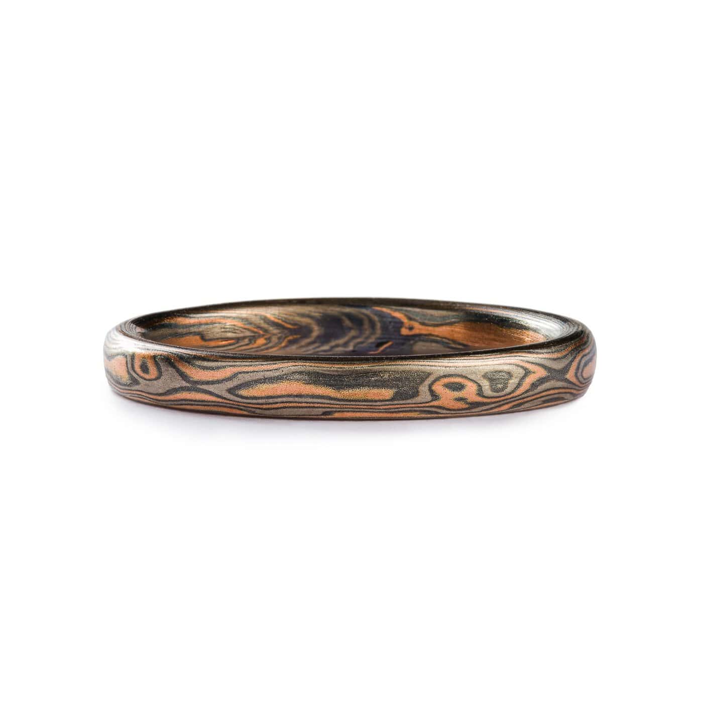 mokume gane woodgrain patterned, metals in the ring are red gold silver and palladium