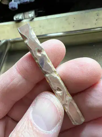 mokume gane stock in preparation for a guri bori ring, with three dimensional carving for the pattern