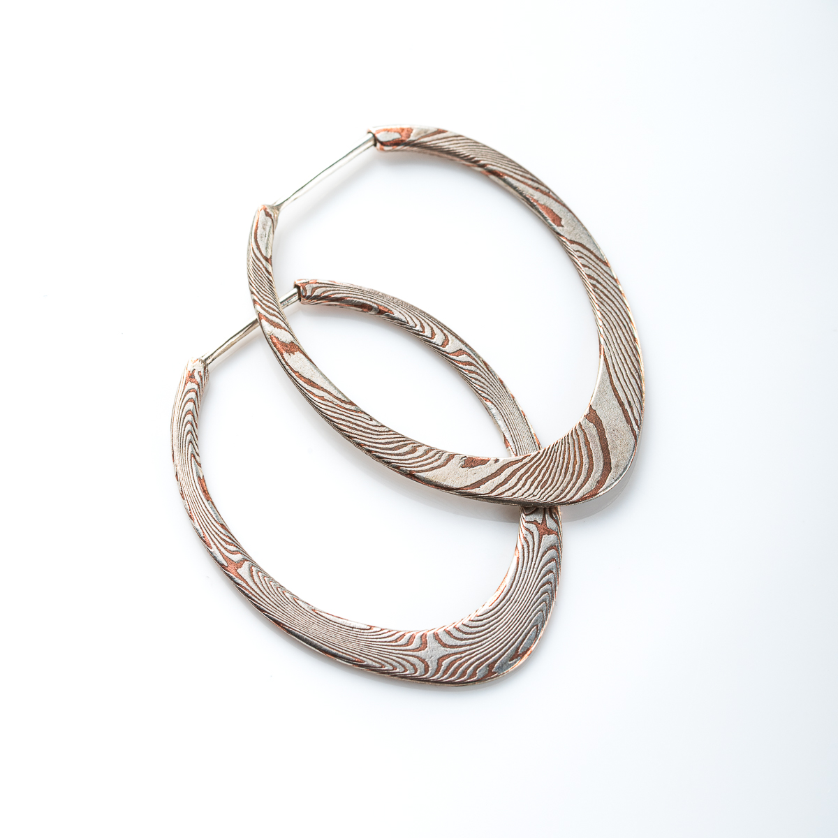 hand forged mokume gane silvery woodgrain patterned earrings