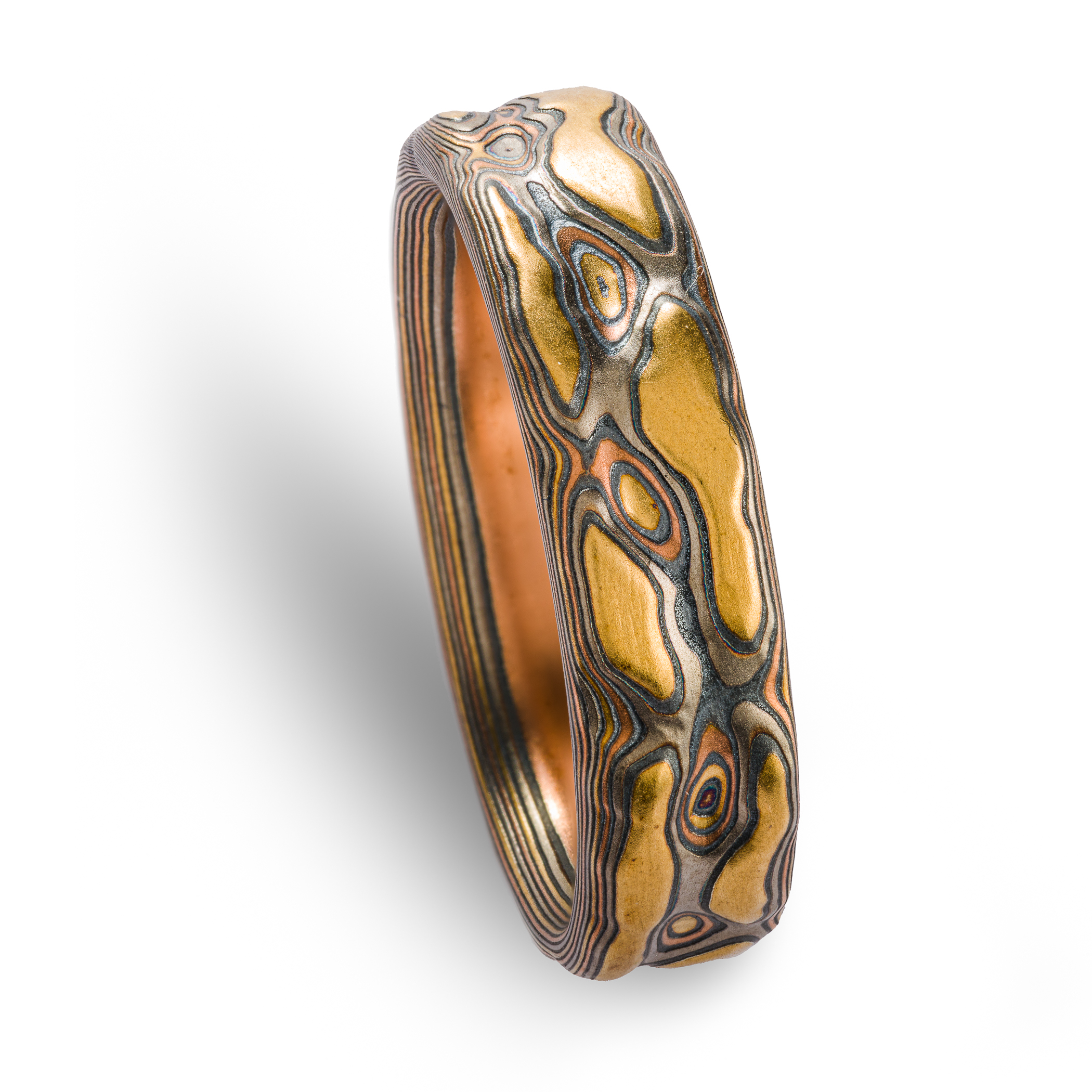 This 6mm Mokume Gane ring in Guri Bori style has a unique tactile beauty with swirling patterns in the Firestorm metal combination.